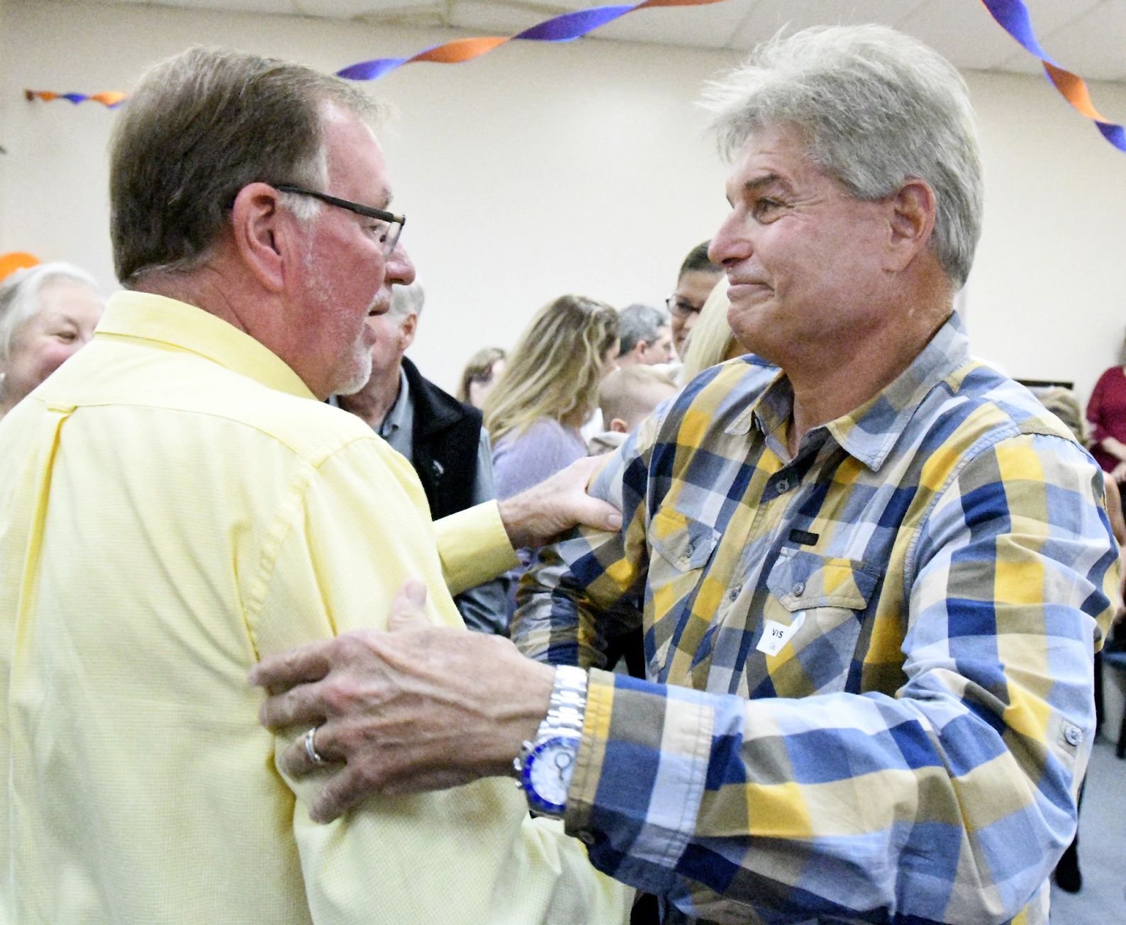 Steve Lamb congratulating Gerry on 40 years with the Chronicle